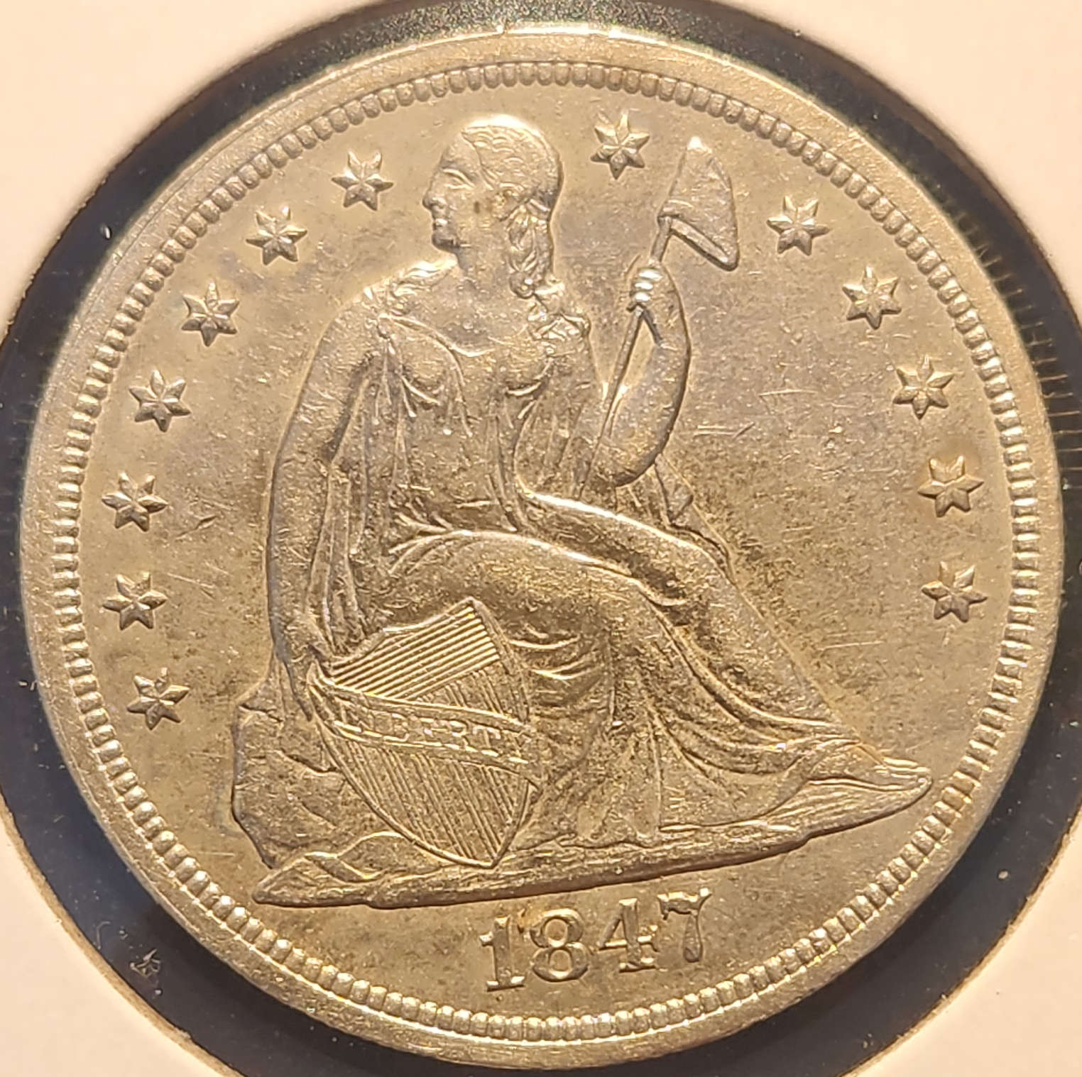 1847 Seated Liberty Dollar